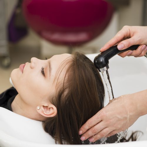 blonde-girl-getting-her-hair-washed blonde-girl-getting-her-hair-washed
